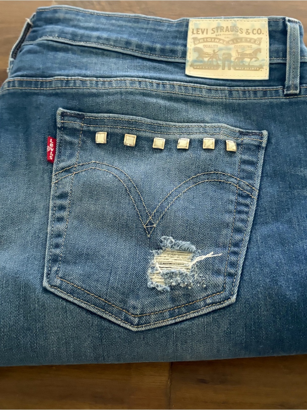 Levi's Blue Distressed Denim Jeans with Studded Back Pocket